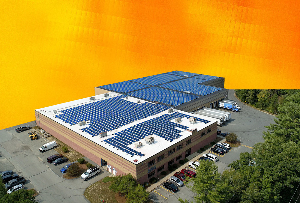 Commercial building rooftop solar panels aerial